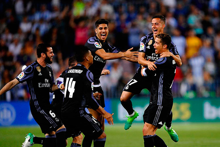 Real Madrid gana en Málaga y levanta su título de liga 33