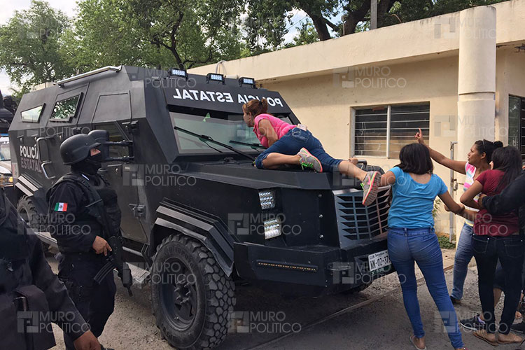 Familias hacen frente a traslado de 15 reos