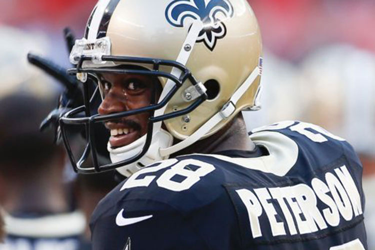 Adrian Peterson se pinta de rojo en Arizona