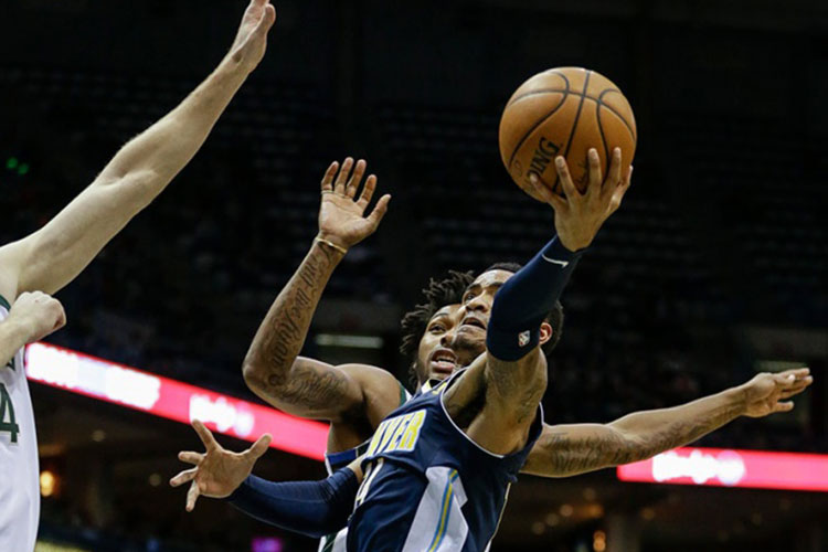 Nuggets dan cátedra de triples a los Bucks