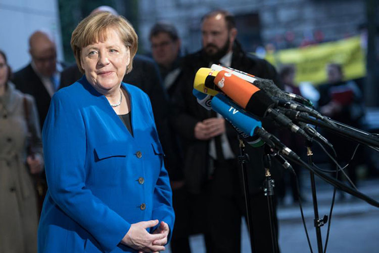 La militancia socialdemócrata aprueba la coalición con Merkel