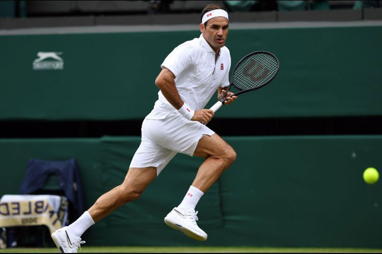 Federer pasa sin problemas a la segunda ronda de Wimbledon