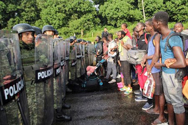 Detiene la Guardia Nacional caravana de migrantes