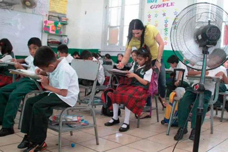 Conveniente recortar horario escolar por onda calor